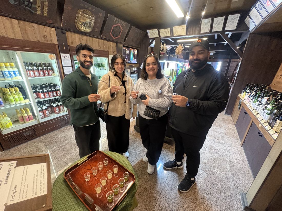 Guests at the sake brewery