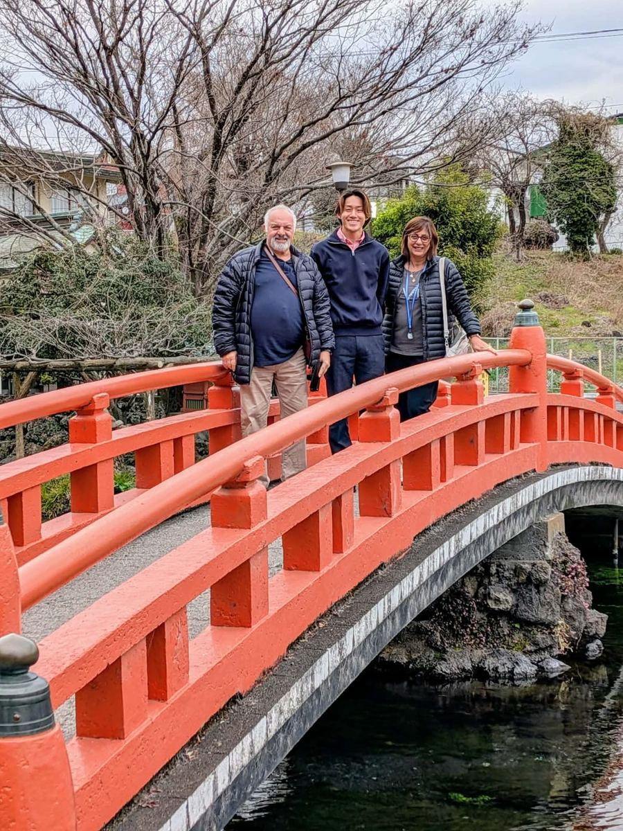 Group on a red bridge