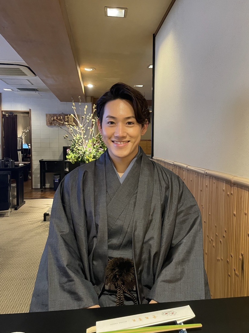 Takumu (Taku) Makino, founder of Fuji Soul Tours, in a kimono at a traditional restaurant